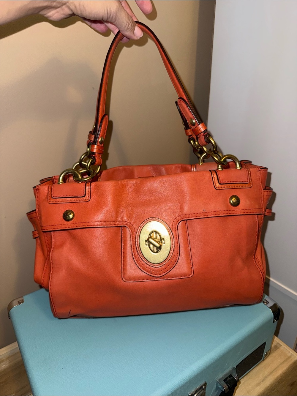 Women's Orange Leather Shoulder Bag with Turn-Lock Accent